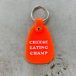 Load image into Gallery viewer, Cheese Eating Champ Saddle Keychain
