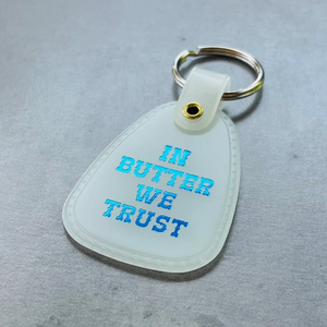 In Butter We Trust Saddle Keychain - Glow In the Dark