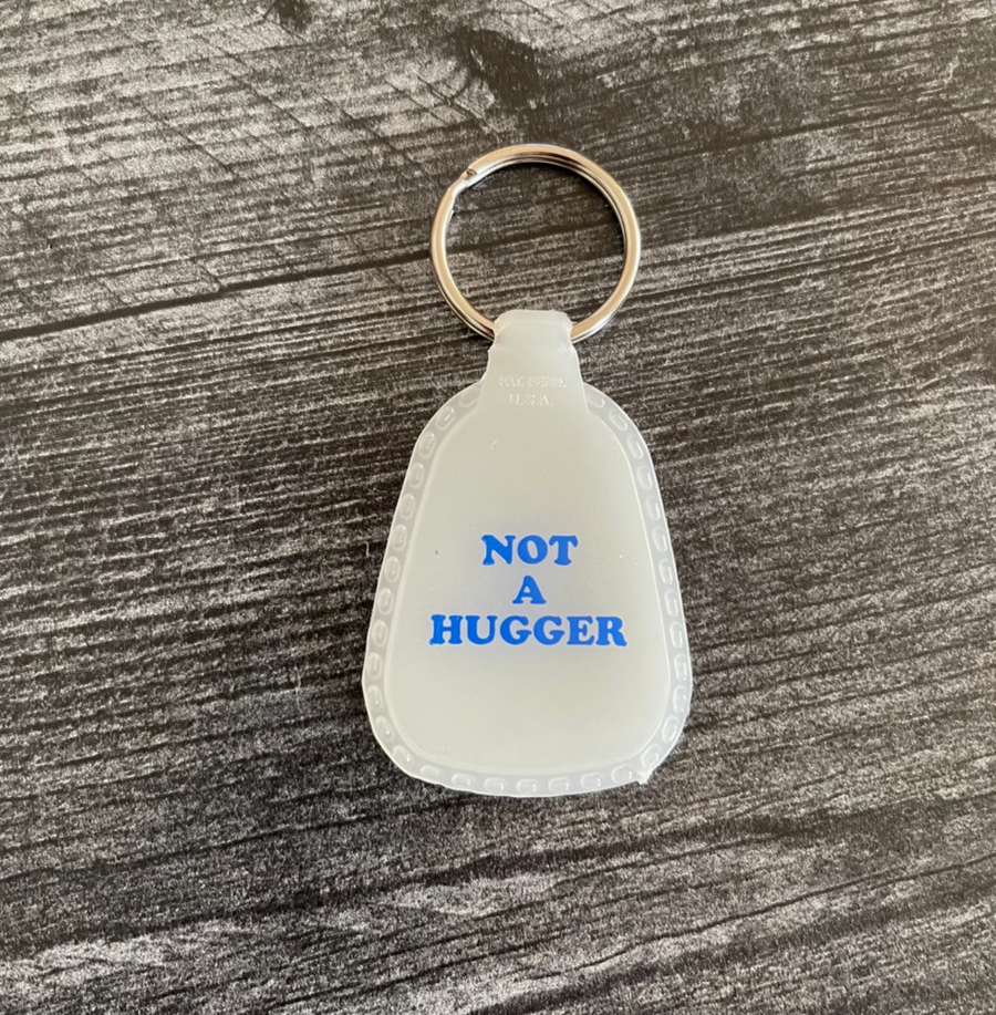 Not A Hugger Keychain - White