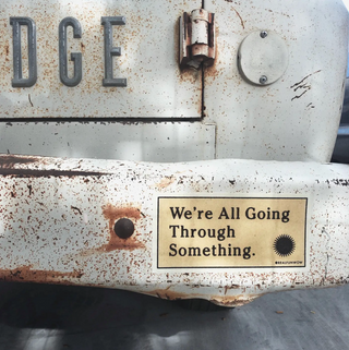 We're All Going Through Something' Bumper Sticker